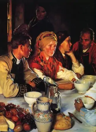 Comida con trexes tradicionais galegos